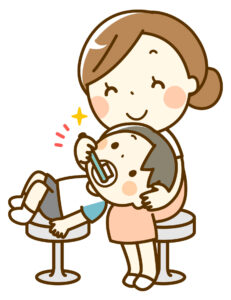 フッ素塗布をする衛生士